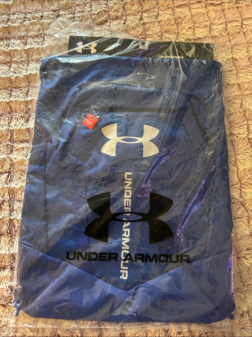 Under Armour Navy Blue Backpack with Black Logo with tie string on top